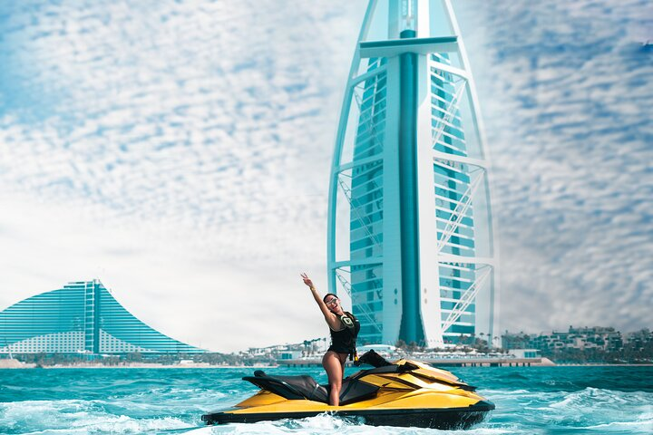 Experience the thrill of cruising on a luxurious gold jet ski while marveling at the stunning Burj Khalifa and Dubai's iconic skyline. A truly unforgettable adventure awaits!